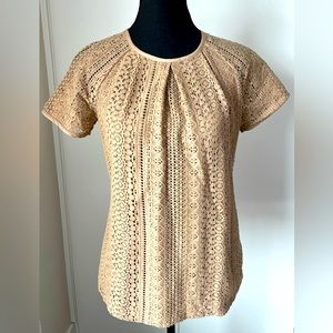 Banana Republic, size 4 lace top, rounded neckline and zip up in back.